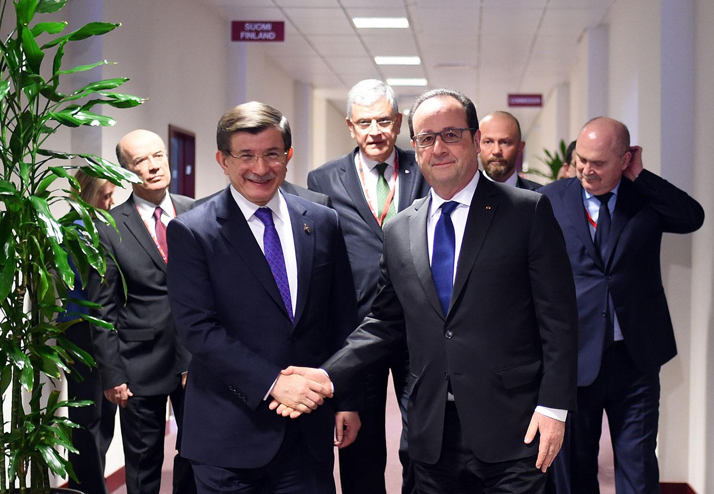 Ahmet Davutoglu och Francois Hollande.