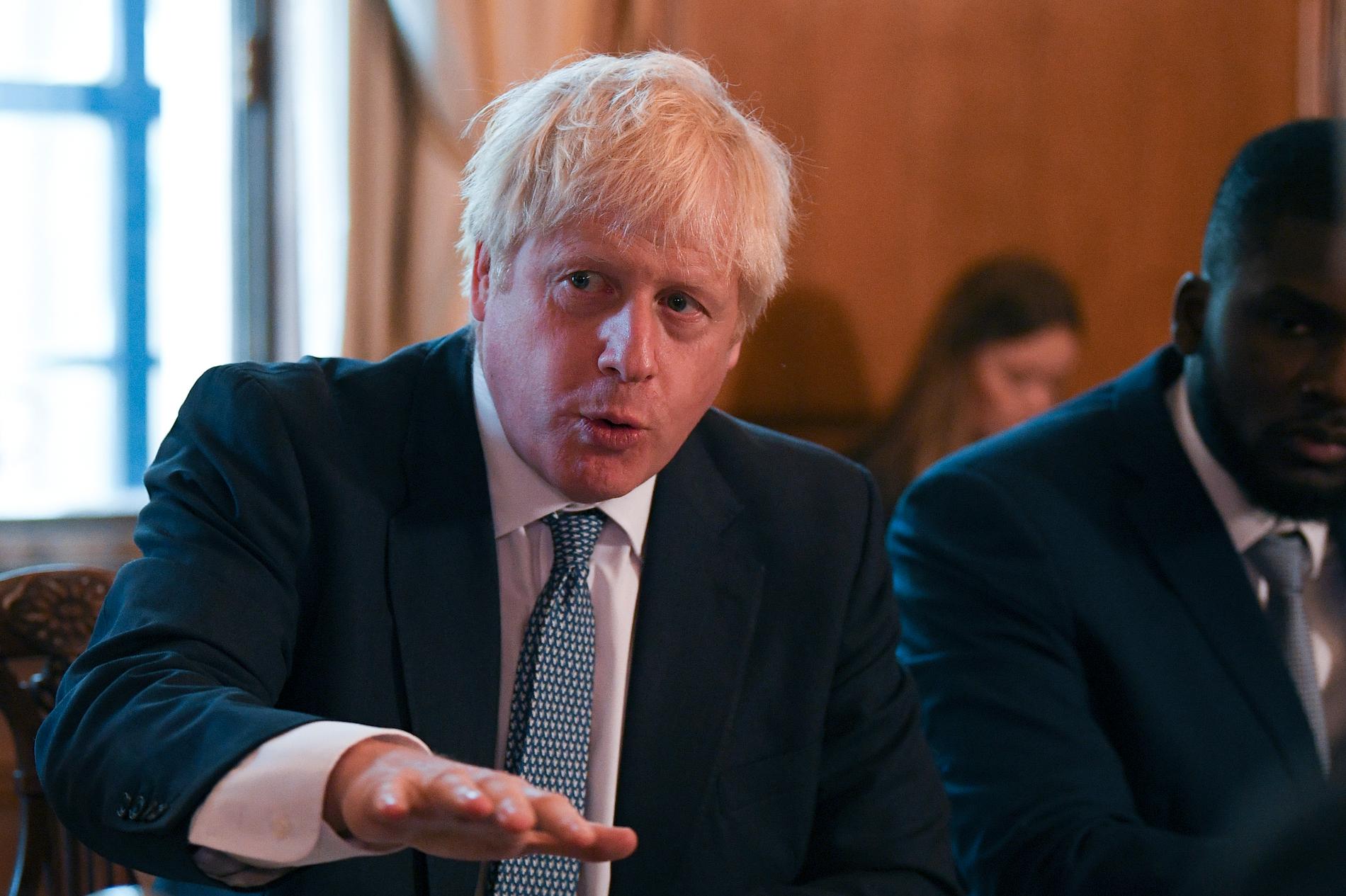 Storbritanniens premiärminister Boris Johnson skärper tonen inför brexit. Arkivbild från den 12 augusti.