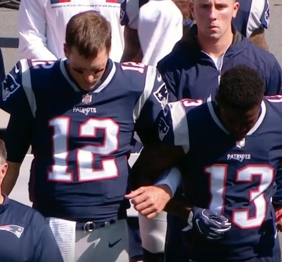 New England Patriots Tom Brady i armkrok med Pihillip Dorsett 
