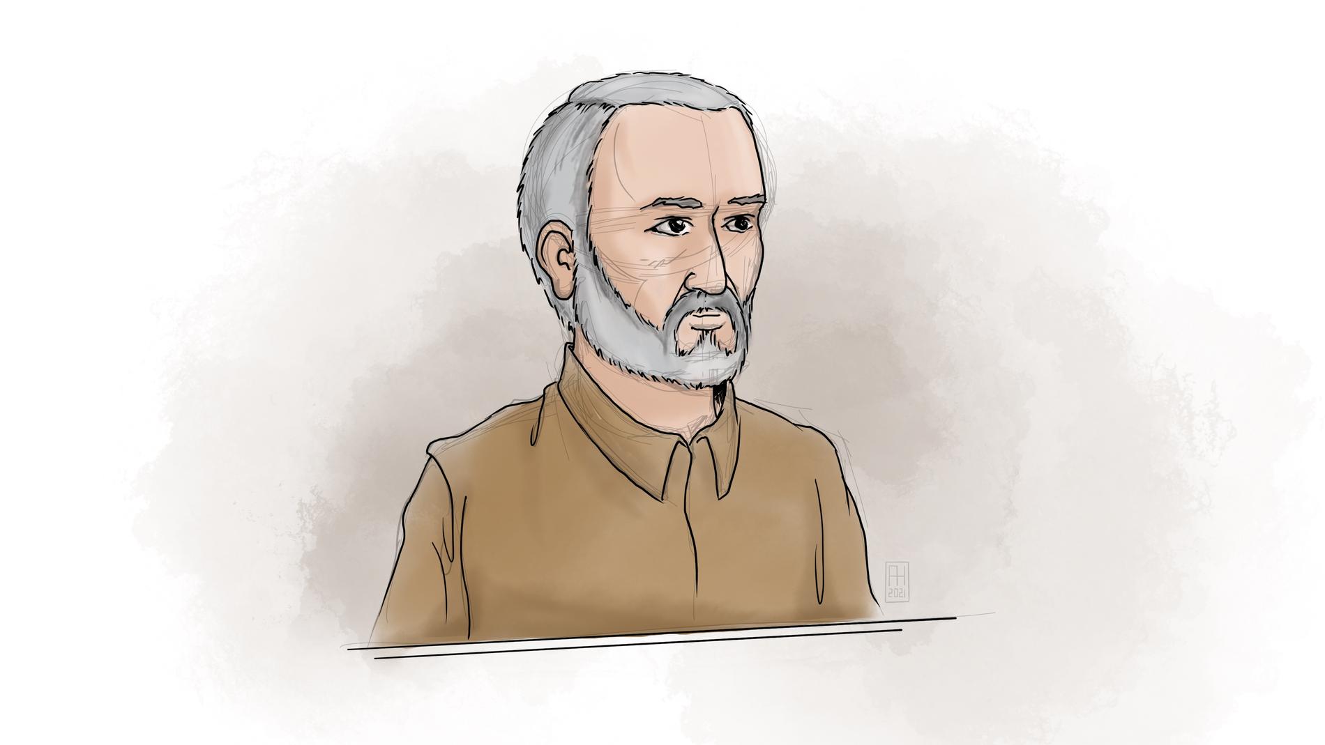 Hamid Noury, misstänkt för grovt brott mot folkrätten och flera mord, i tingsrätten när försvaret lade fram sin sakframställan i augusti 2021.