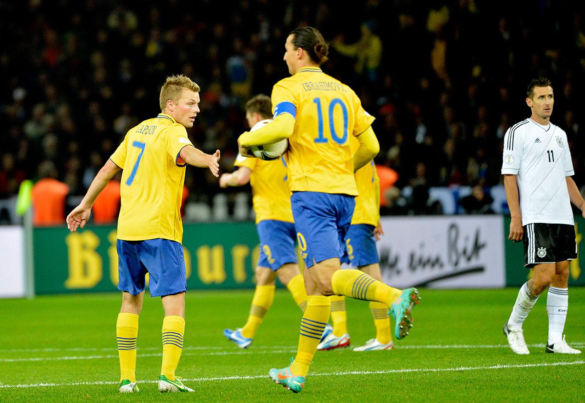 16 oktober 2012 På olympiastadion i Berlin stod det 4–0 till hemmalaget då Sverige började hämta upp. Zlatan satte mål nummer ett, och det som sedan hände blev historia. 4–4 i slutskedet av Rasmus Elm och en viktig poäng i kvalet hade bragdbärgats.