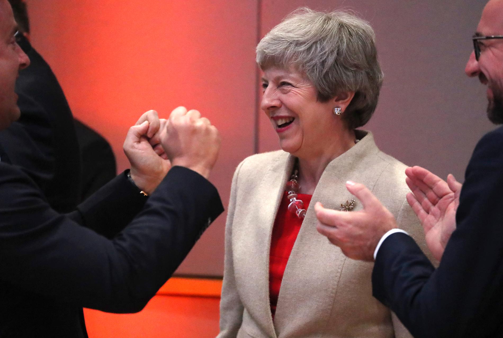 Glada miner, trots allt, från Storbritanniens avgående premiärminister Theresa May vid ett av sina sista toppmöten i EU. Den 7 juni lämnar May partiledarposten i brittiska Tories.