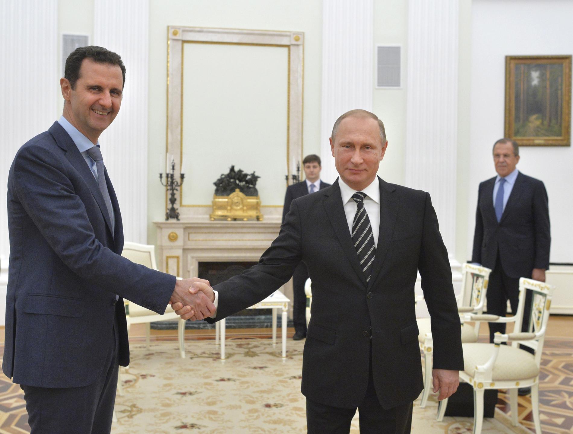 Syriens president Bashar al-Assad och Putin.