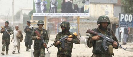 Afghanska soldater på patrull i utkanten av Kandahar, söder om Kabul.