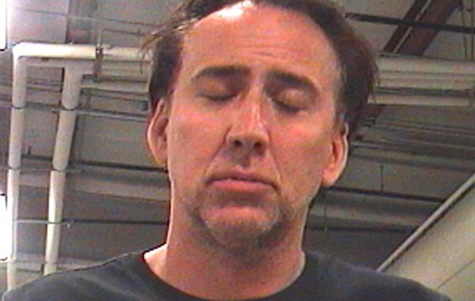 Mugshot när Nicolas Cage greps i New Orleans 2011 efter ett bråk med sin dåvarande fru Alice Kim.