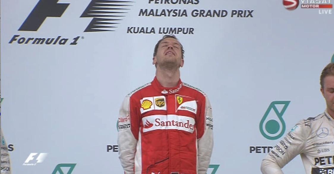 En tagen Sebastian Vettel på prispodiet.