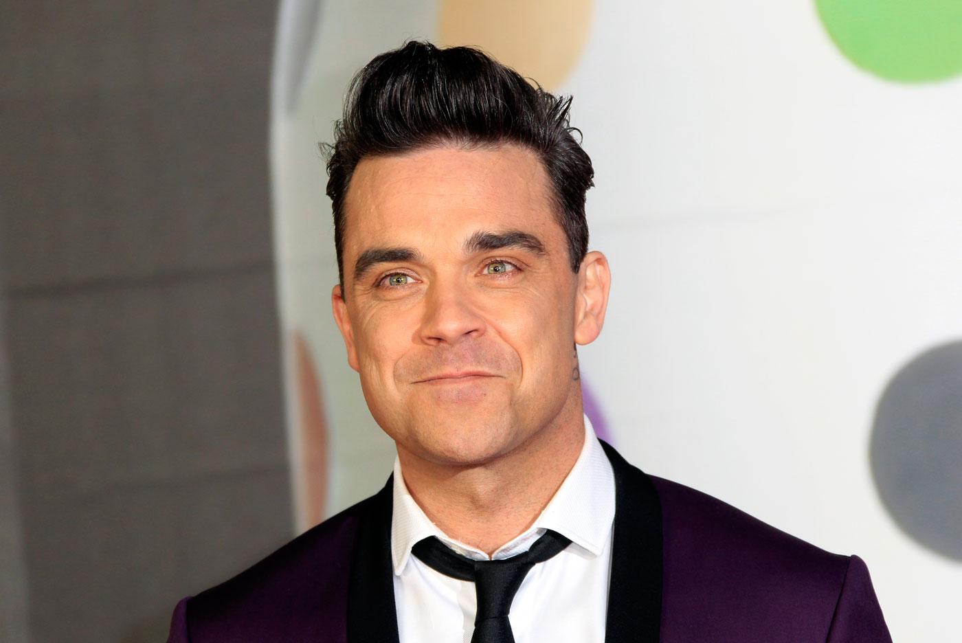 Robbie Williams till One Directions försvar.