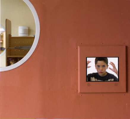 Konstnären Dan Utterström har fällt in videoskärmar i väggarna på Bällstabergsskolan i Vallentuna