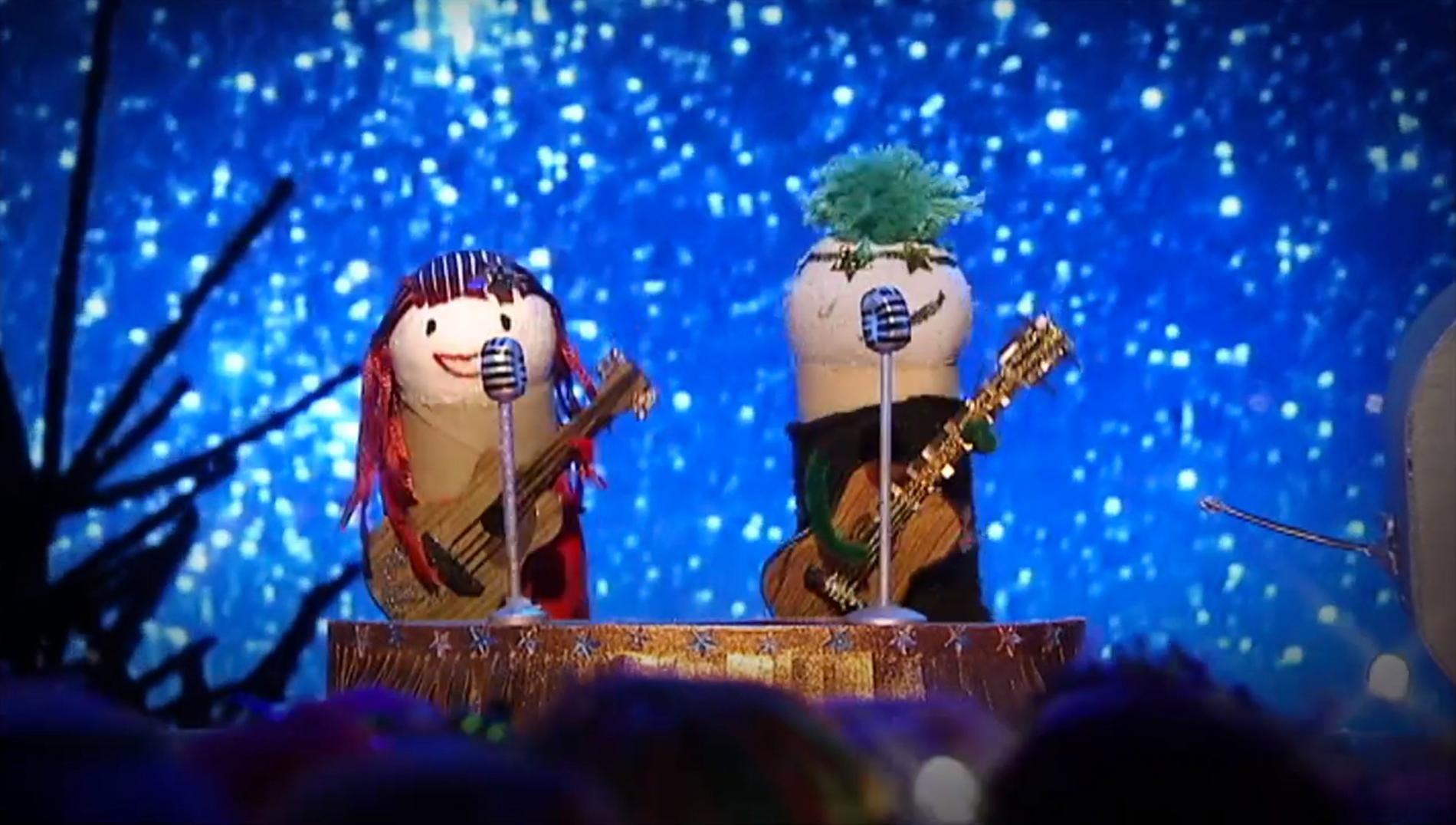 Rock'n'rulle Rocky och Simone framför ett av bidragen i ”Minimello”.