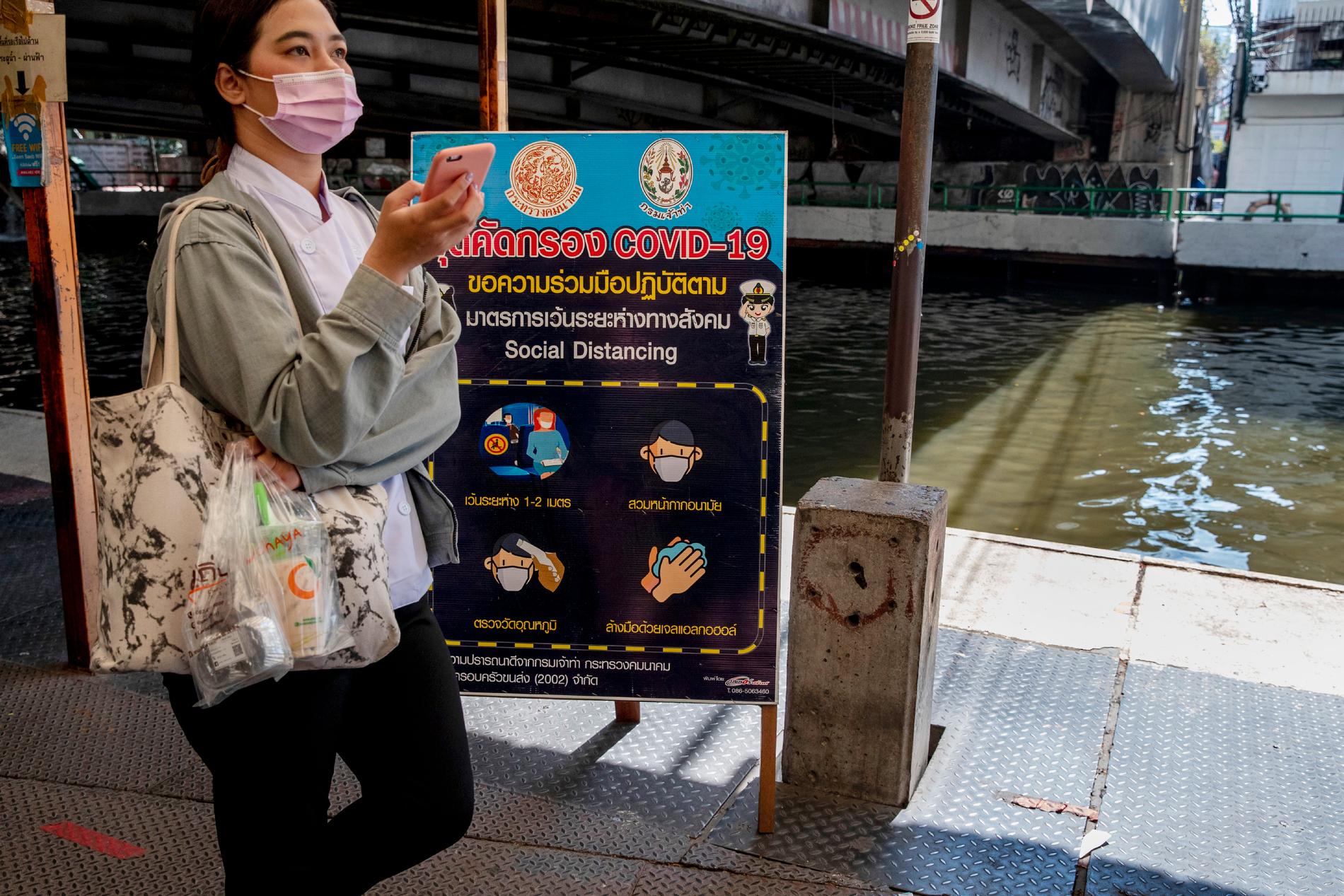 Nu skippar Thailand kravet på munskydd. Arkivbild
