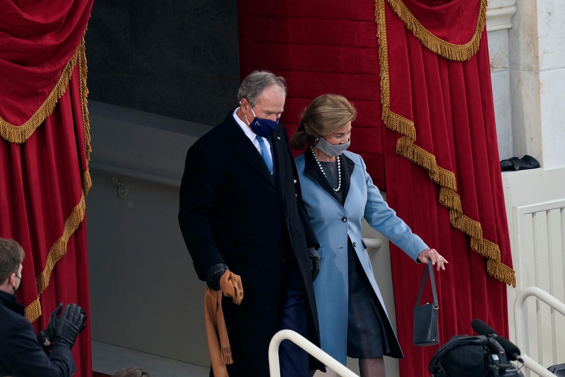 Tidigare president George W Bush med fru Laura Bush.