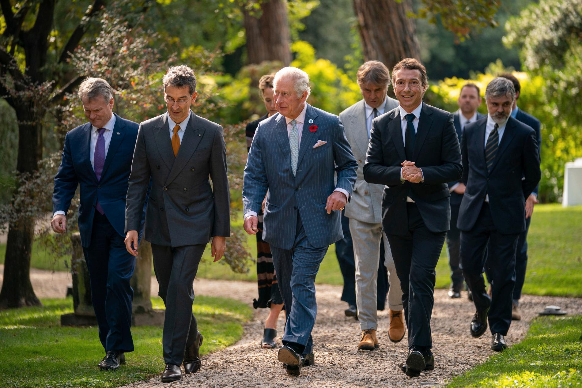 Storbritanniens Prins Charles, i mitten, har vädjat till deltagarna på G20-mötet att agera kraftfullt för allas framtid.