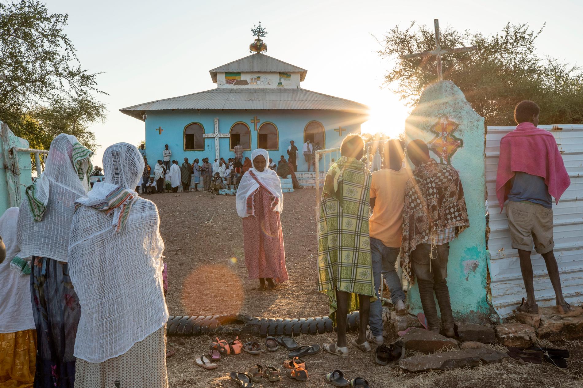 Tigreaner som flytt kriget vid en gudstjänst vid flyktinglägret Umm Rakouba i Sudan.