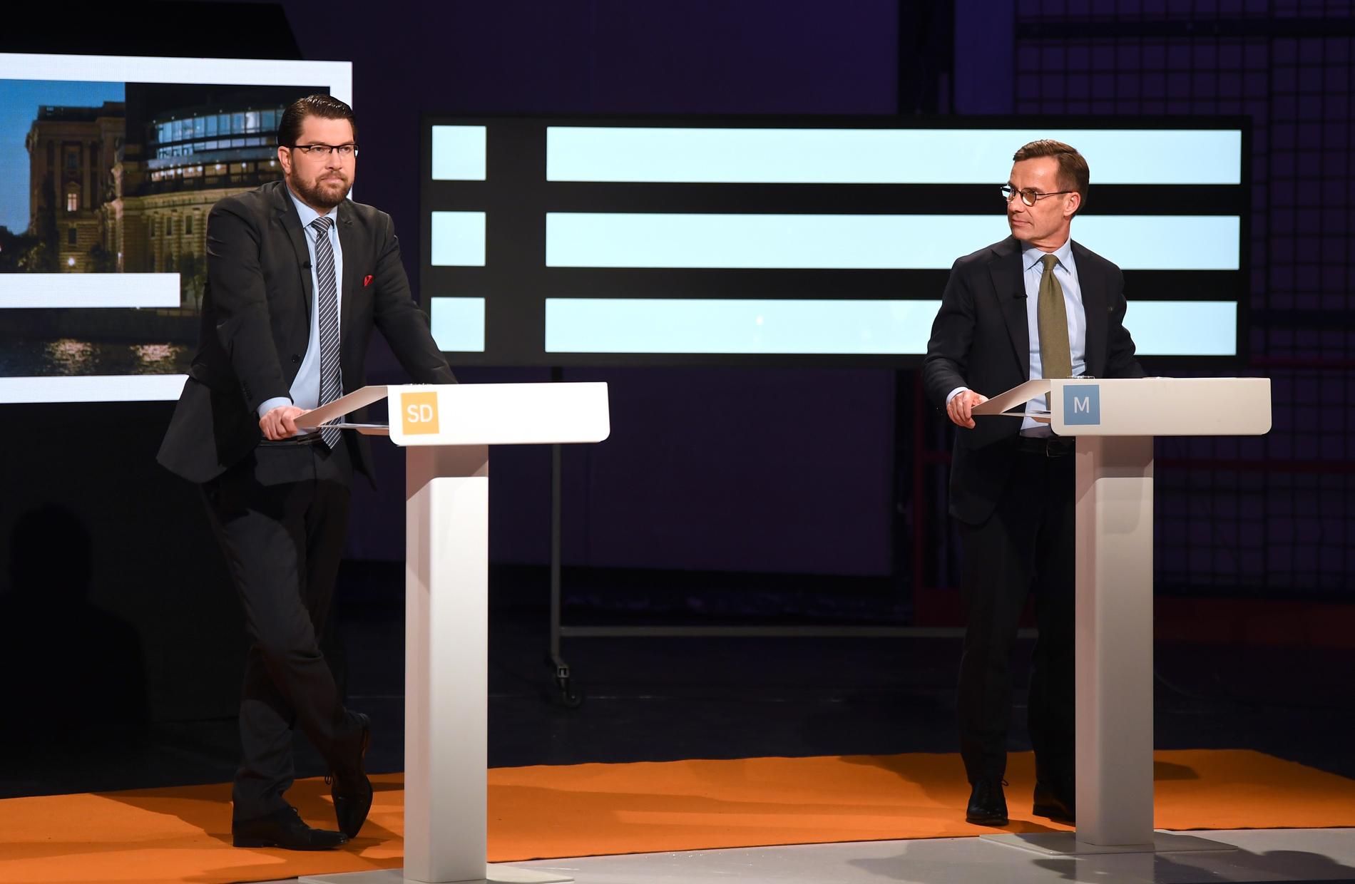 Jimmie Åkesson (SD) och Ulf Kristersson (M) under partiledardebatt i Agenda i SVT i oktober 2021.