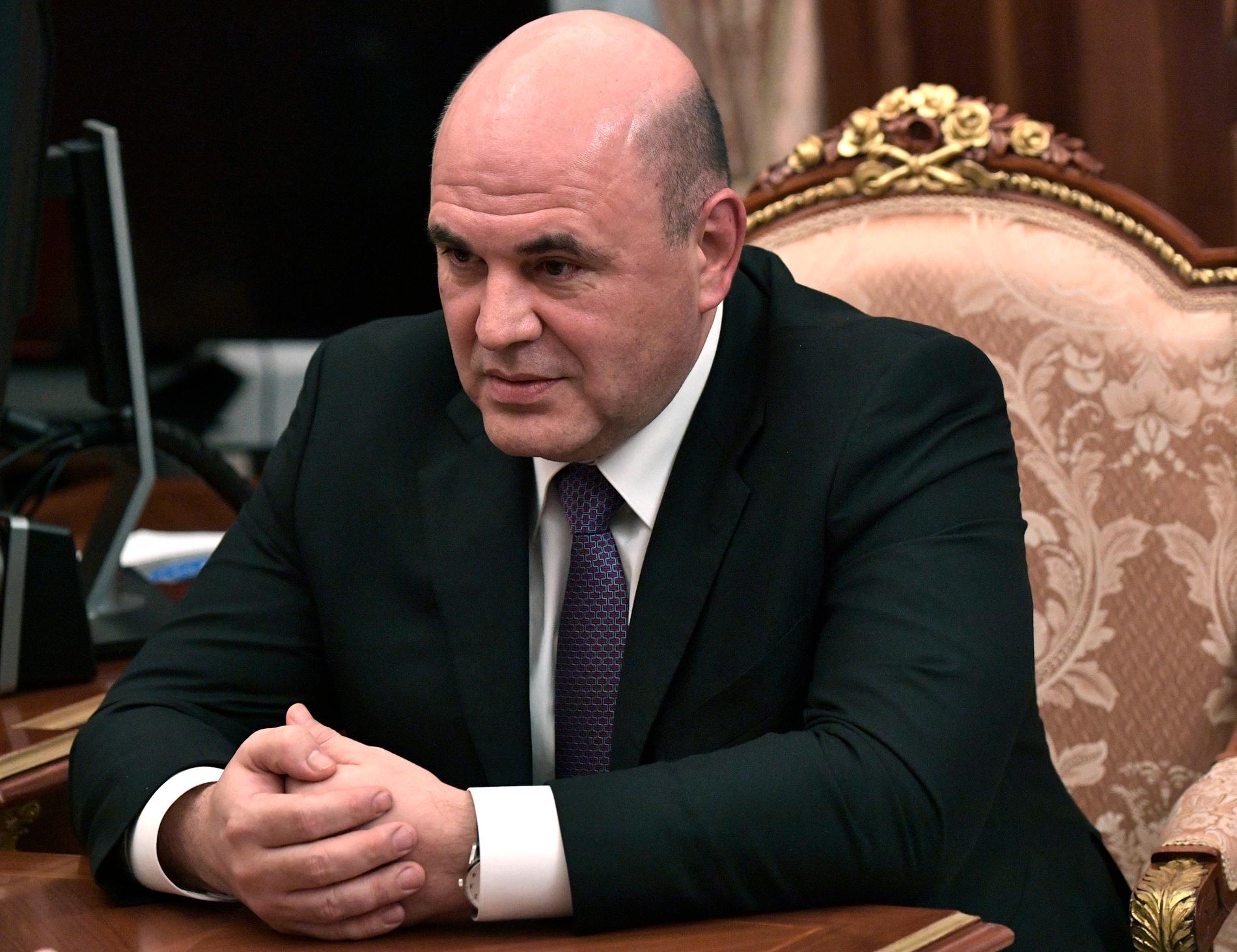 Michail Misjustin har godkänts som Rysslands nya premiärminister av statsduman. Bilden är tagen under ett möte med president Vladimir Putin på onsdagen.
