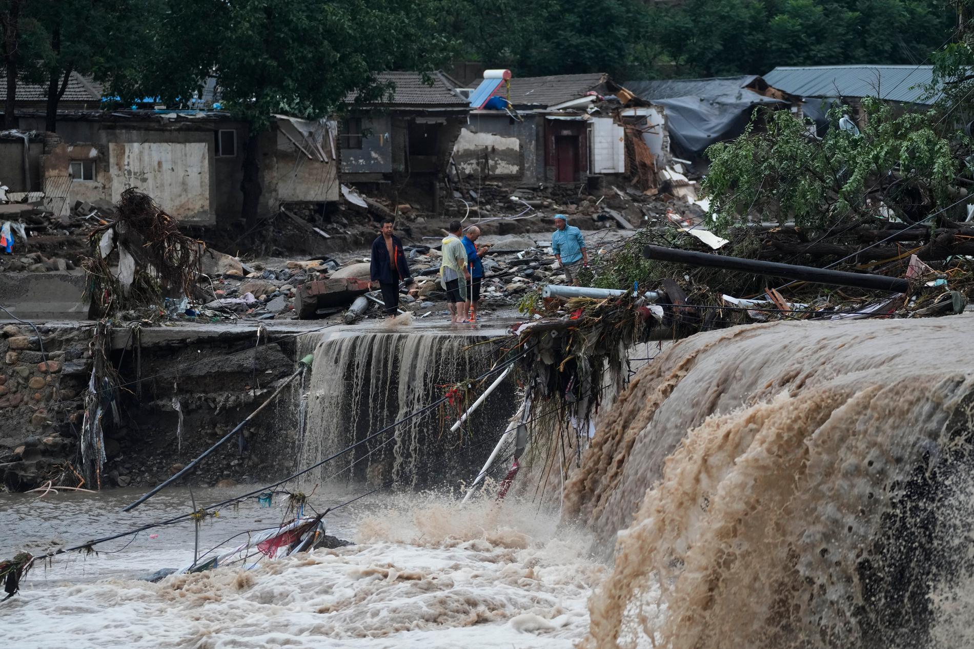 Överstvämningar i Mentougou-distriktet.