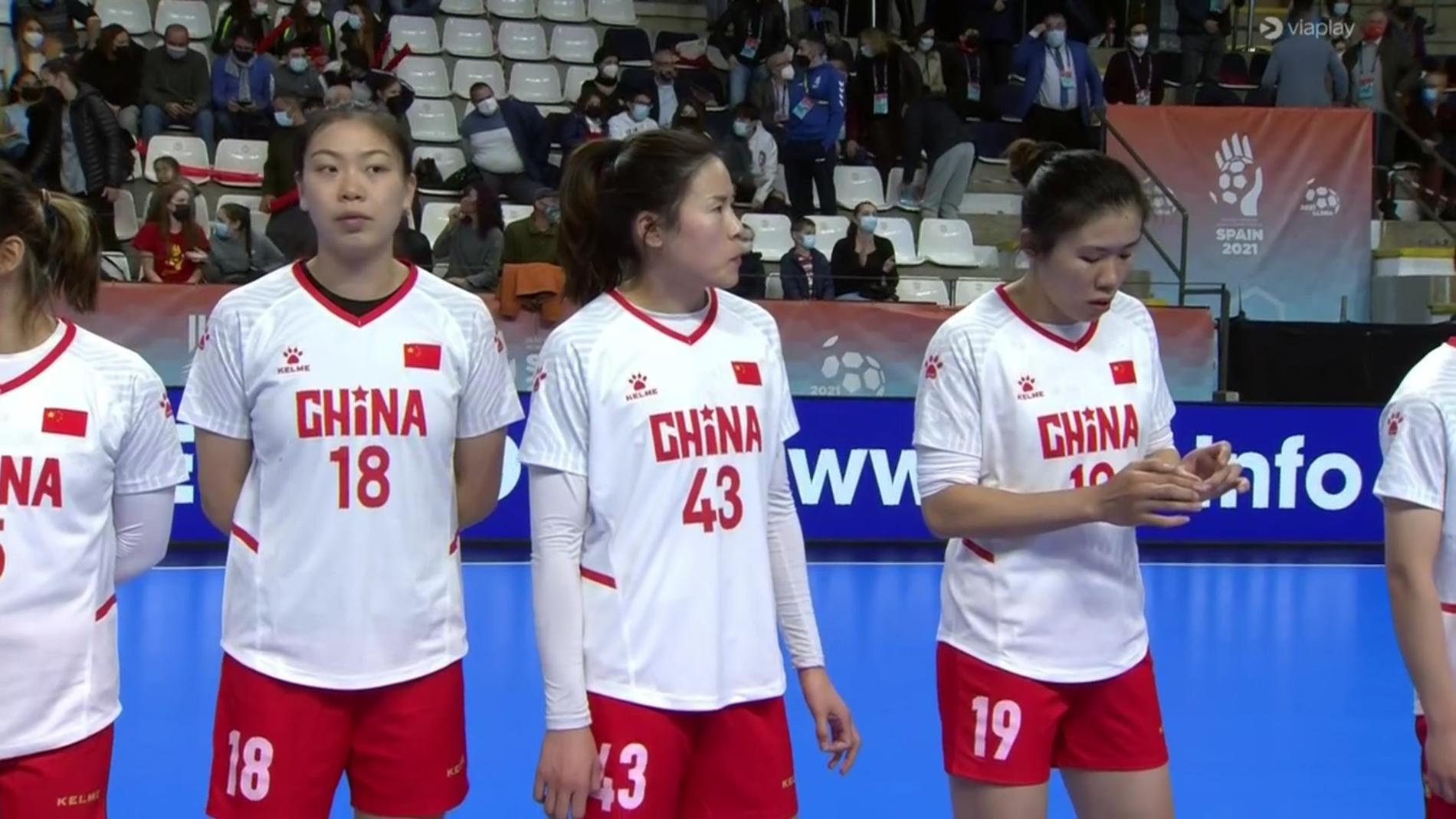 Spelare från Kina efter förlusten mot Paraguay. 