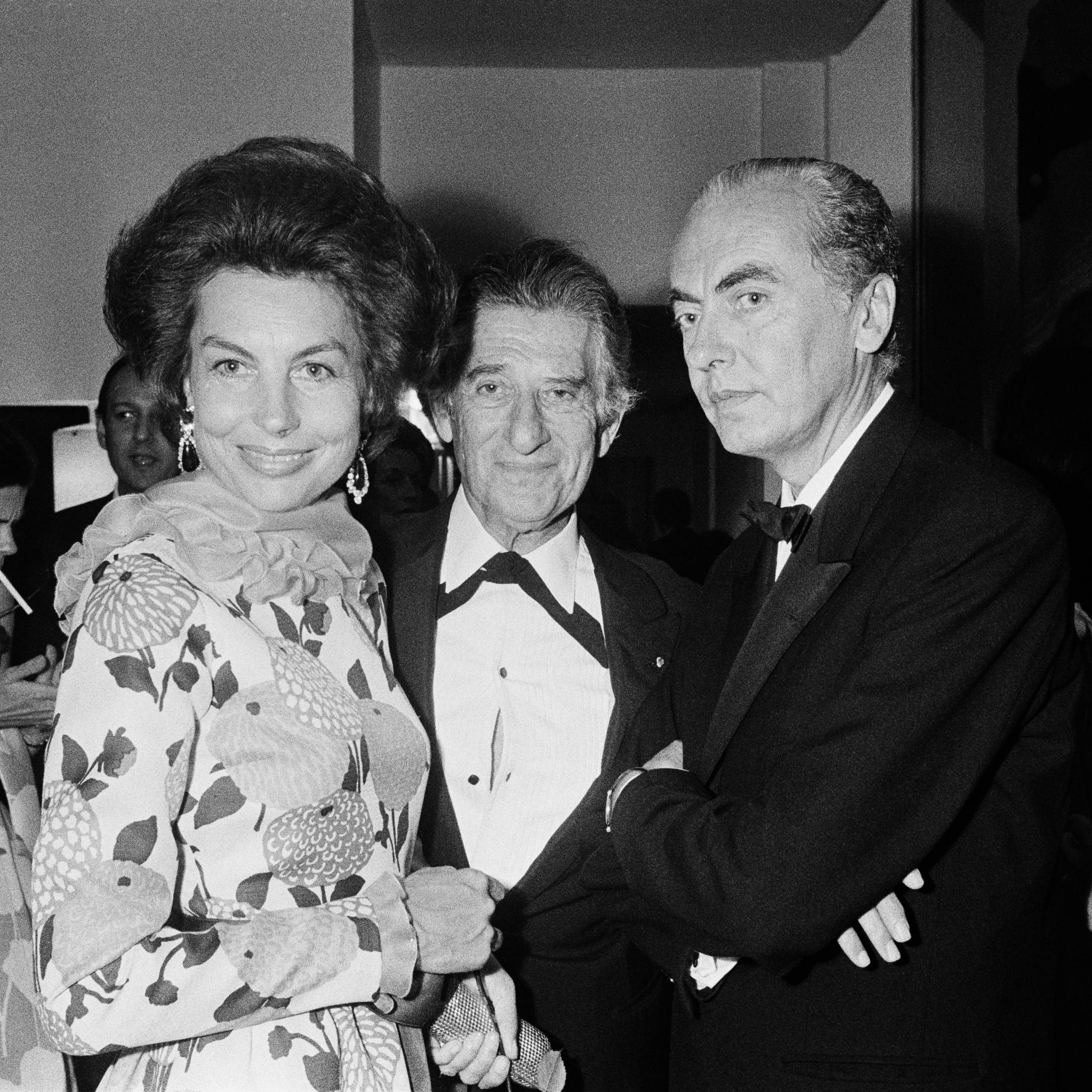 Liliane Bettencourt, tillsammans med sin man, politikern Andre Bettencourt, och finansmannen Paul-Louis Weiller på fest 1973.