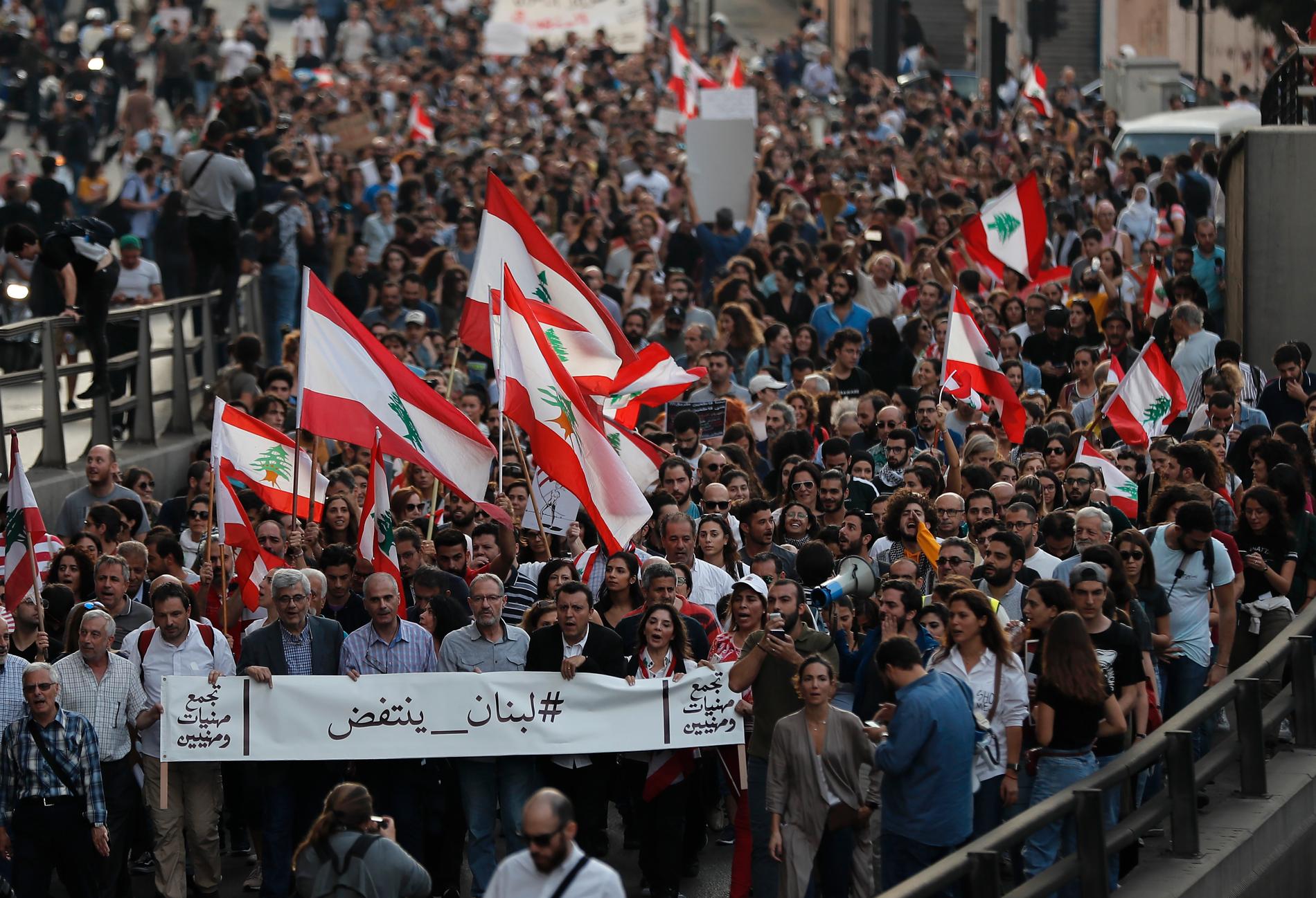 Protesterna, kallade 17 oktober-revolutionen, har pågått i en månad.