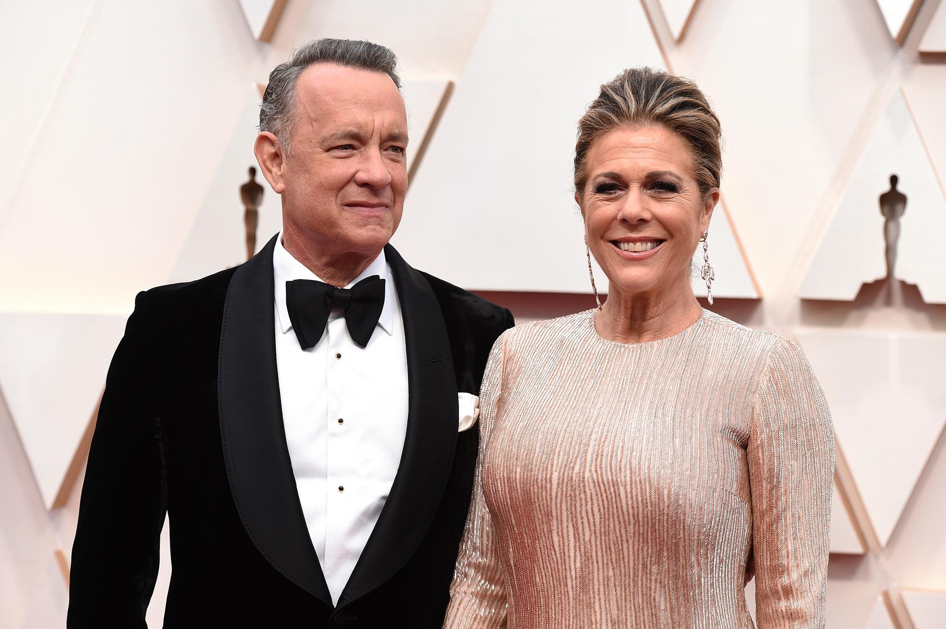 Tom Hanks och Rita Wilson anländer till Oscarsgalan i februari. Nu sitter de på ett hotell i Australien – smittade med coronaviruset.