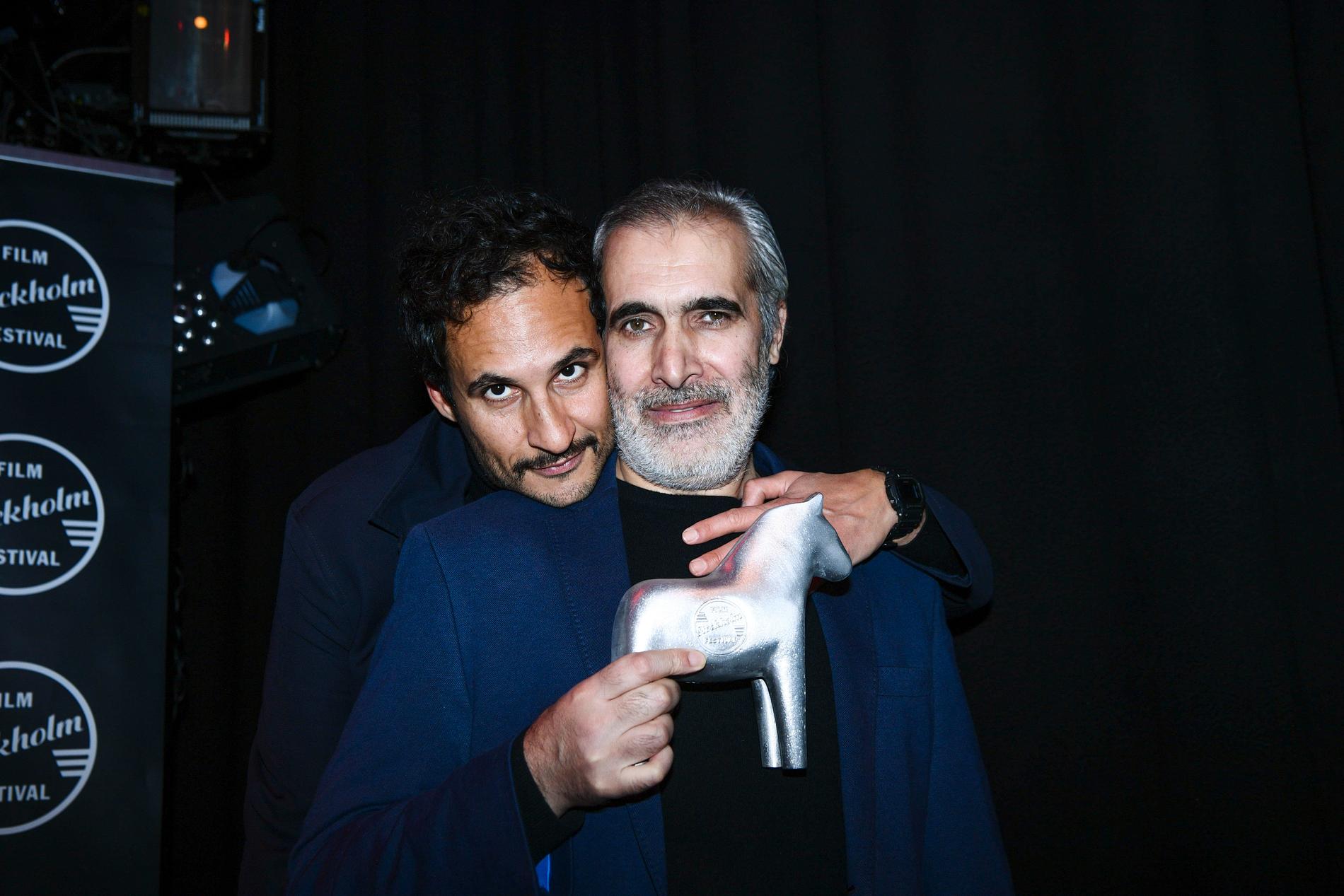 Ali Abbasis, vinnare av priset för Bästa film för "Holy spider", och Mehdi Bajestani, vinnare av priset Bästa manliga skådespelare för sin roll i ”Holy Spider”.