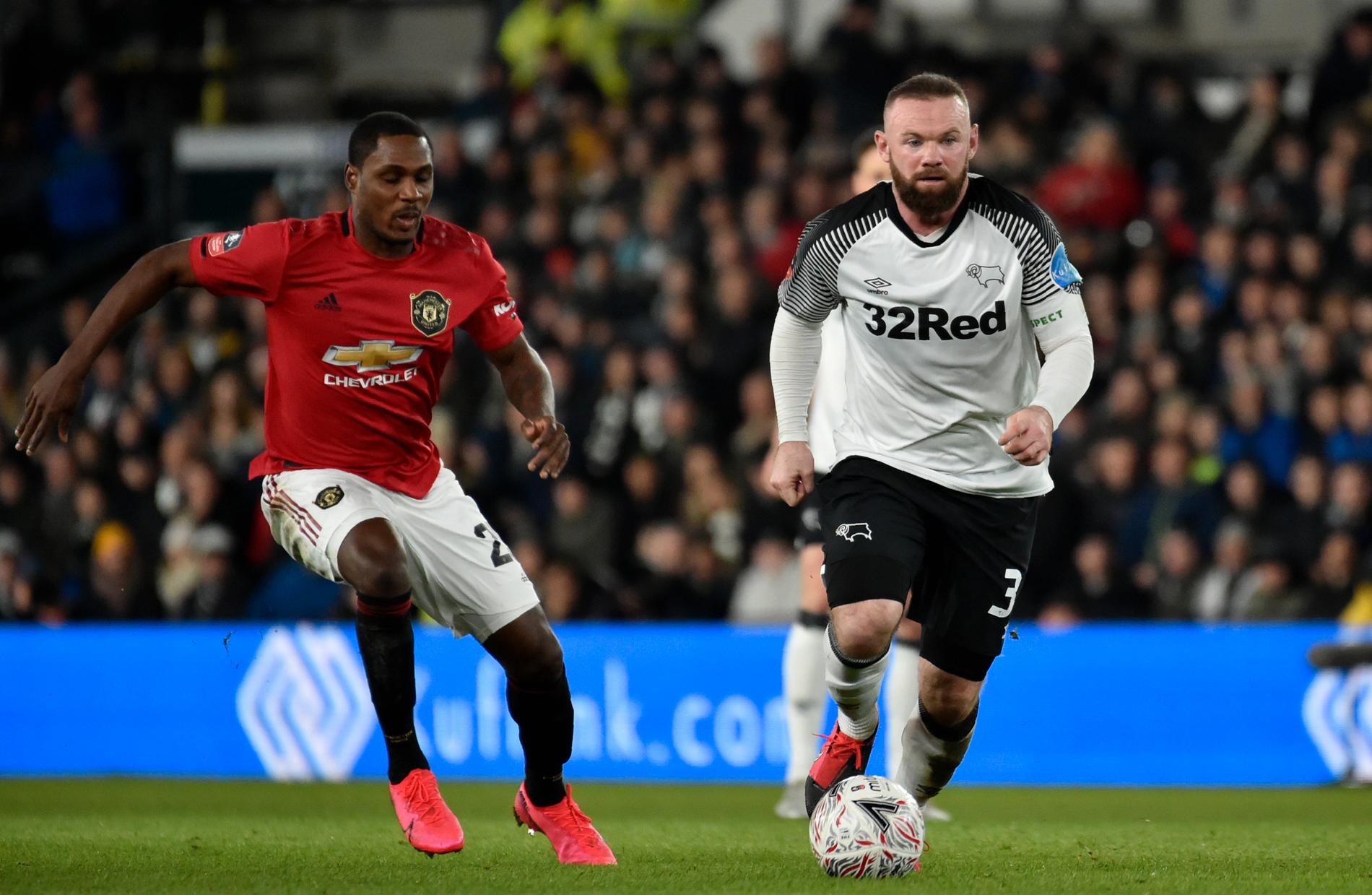Till skillnad från Manchester Uniteds tvåmålsskytt Odion Ighalo (vänster) blev det inget mål för Derbys Wayne Rooney i FA-cupmötet.