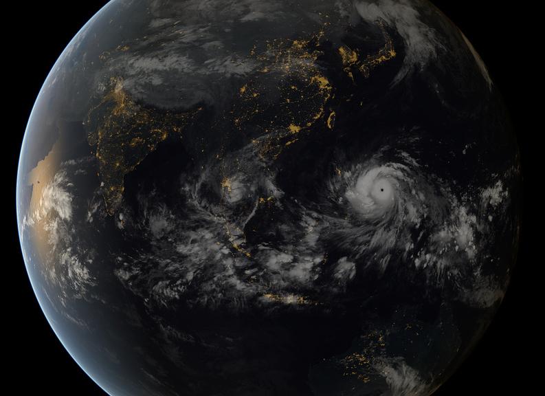 En bild på Haiyan tagen med satelliter från japanska meteorologiska institutet och European Organisation for the Exploitation of Meteorological Satellites (EUMETSAT)