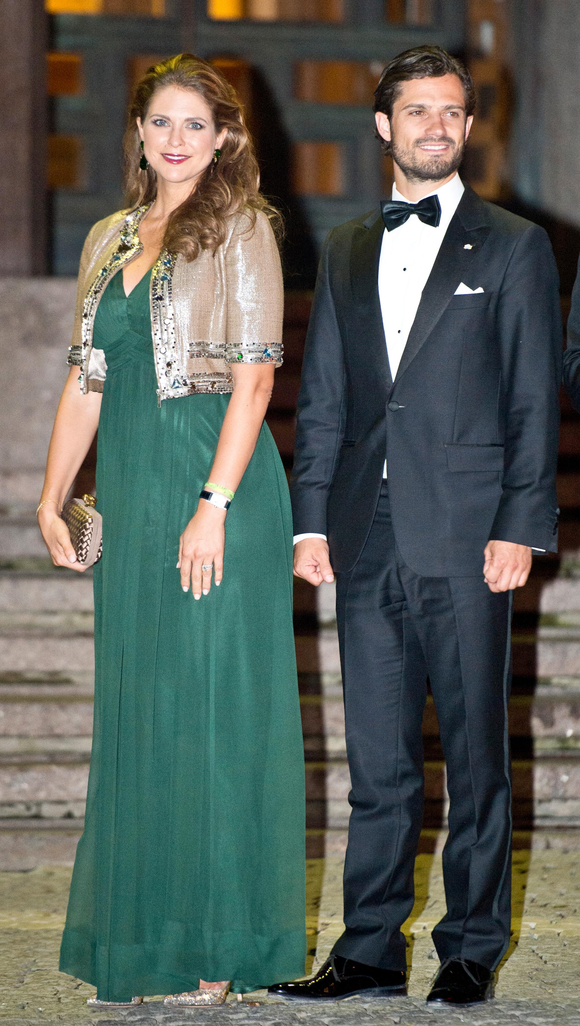 Kungen 40 år på tronen Prinsessan Madeleine och prins Carl Philip är på väg in i Konserthuset i Stockholm för riksdagens jubileumskonsert som hölls den 14 september för att fira Kungens 40 år på tronen.