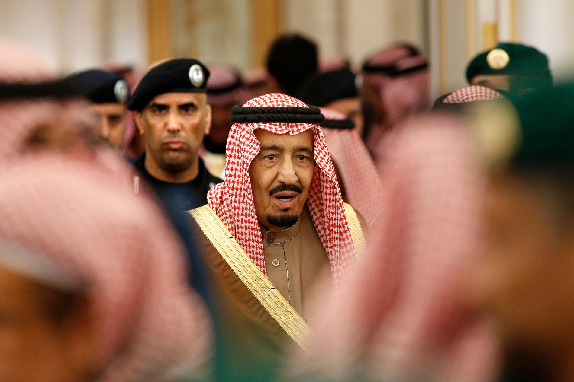 Saudi Arabia's King Salman is guarded by his bodyguard