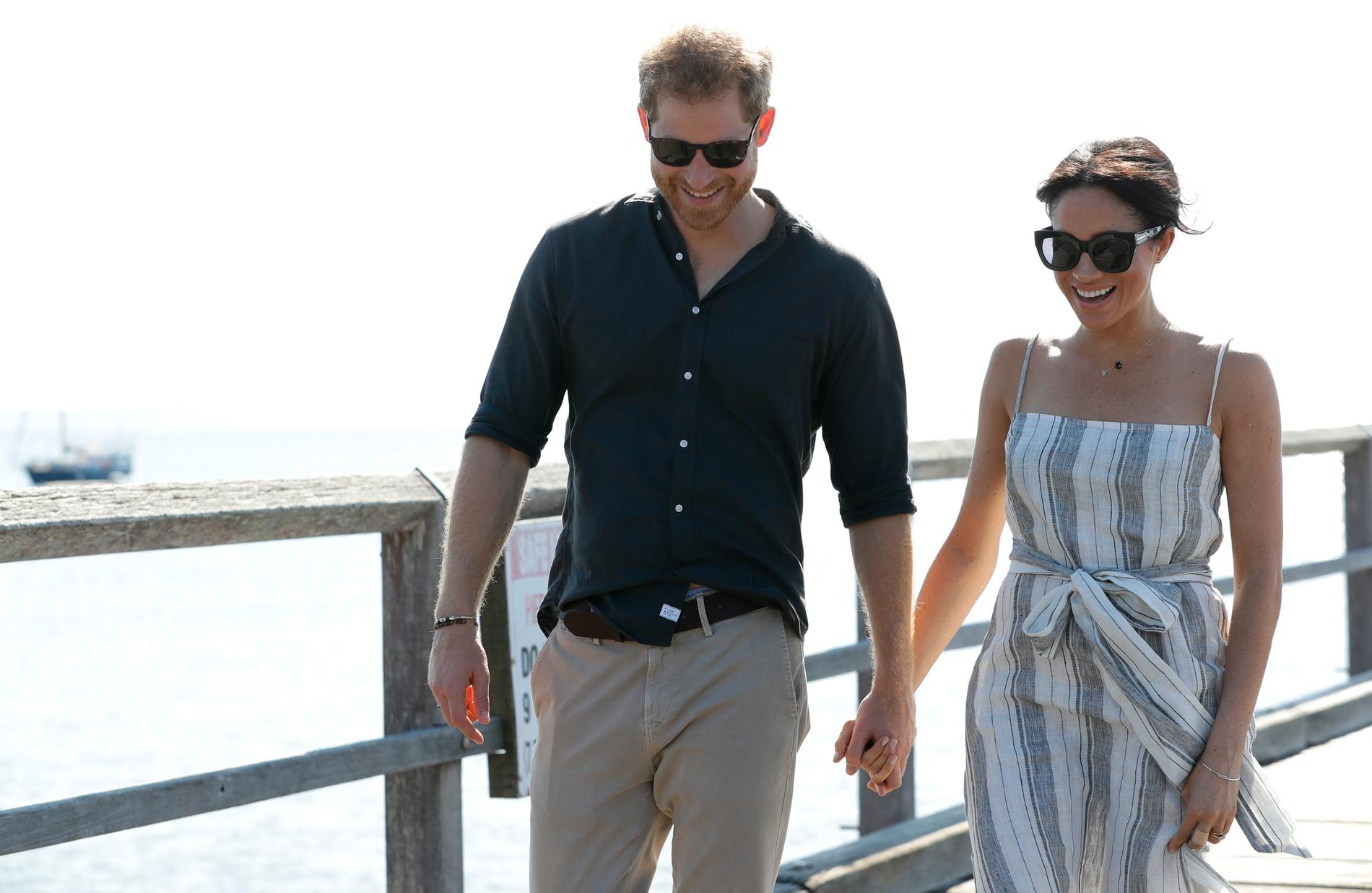 Storbritanniens prins Harry och hustrun Meghan vid ett besök i Australien 2018.