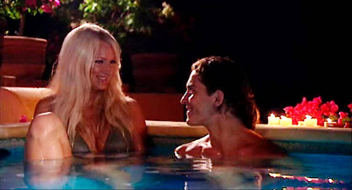 Heta känslor Marie Plosjö och David Lotfi i poolen ”Paradise hotel”-säsongen 2005.