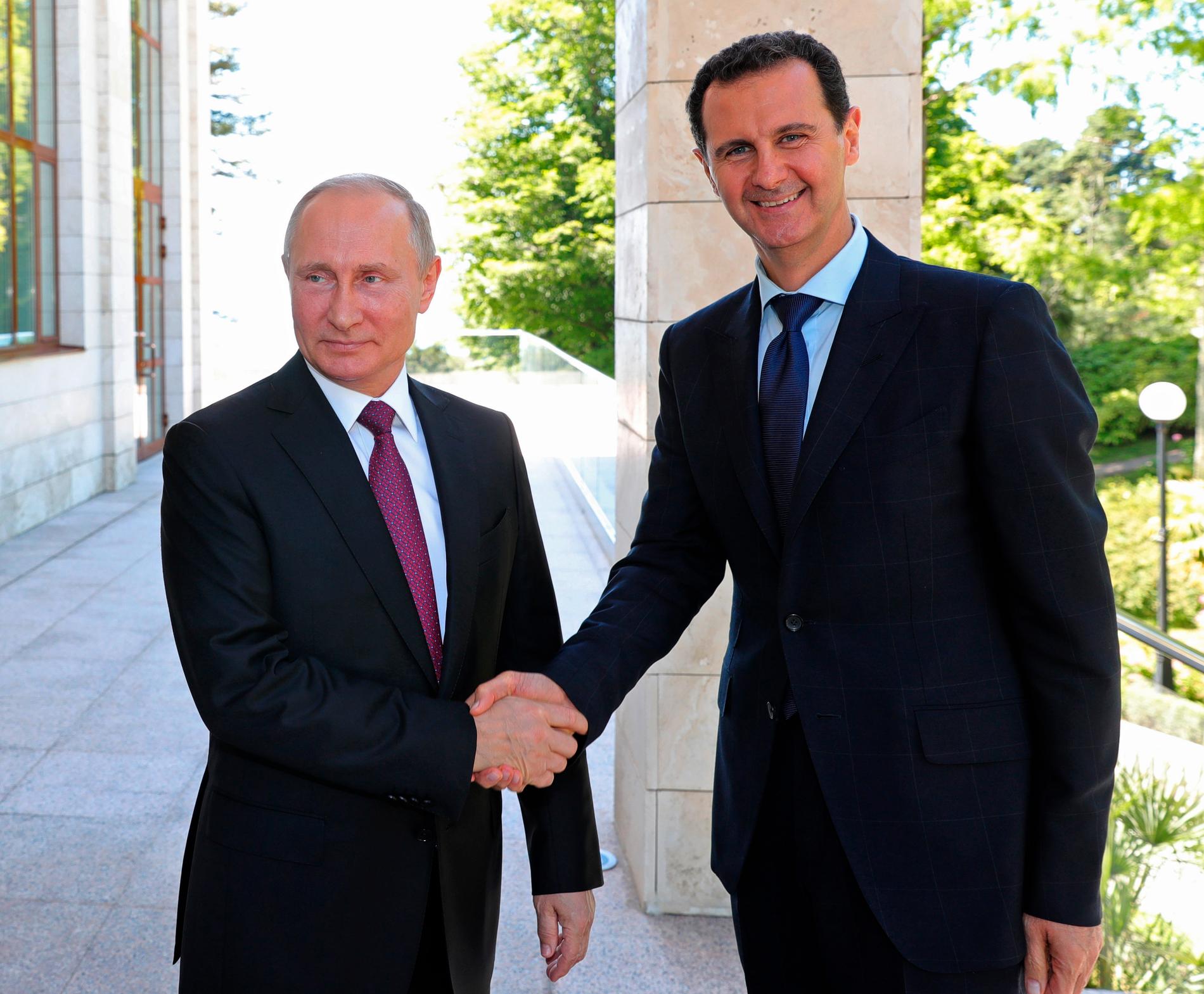 Vladimir Putin tillsammans med Syriens president Bashar al-Assad. 