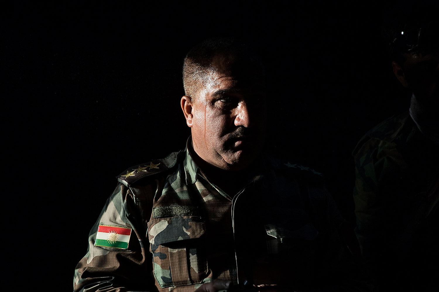 En kurdisk soldat som deltagit i striderna mot IS.