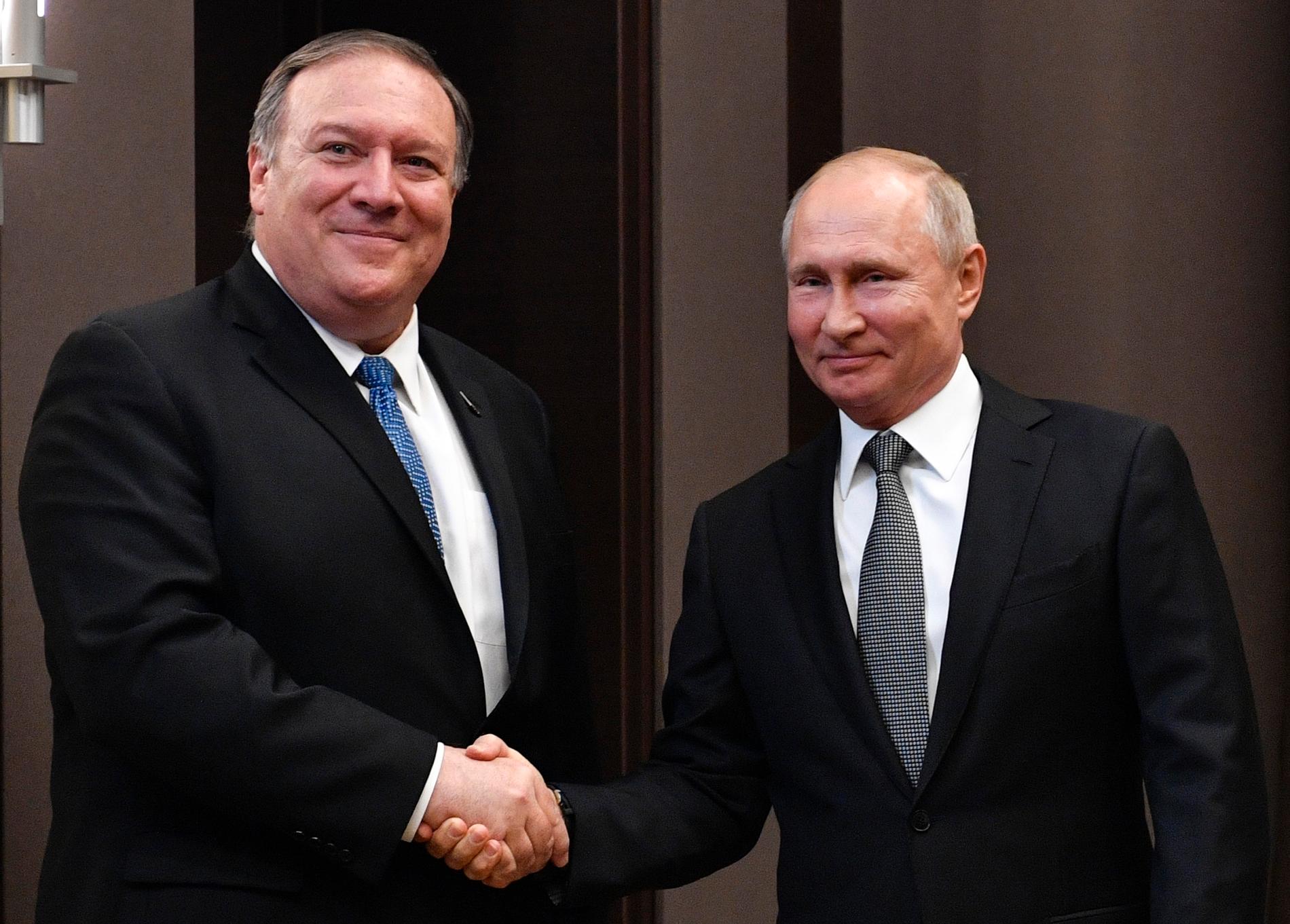 USA:s utrikesminister Mike Pompeo och Rysslands president Vladimir Putin.