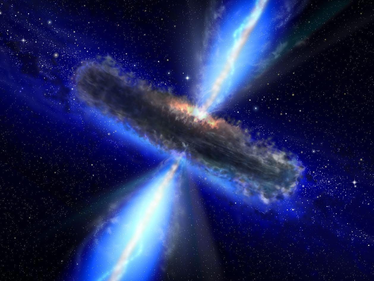 Universum innehåller betydligt fler supermassiva svarta hål än vad man tidigare trott. Bilden, som är en illustration, visar hur ett svart hål, dolt bakom ett tjockt lager av cirklande gas och stoft, suger in och slukar allt i dess väg. Arkivbild.