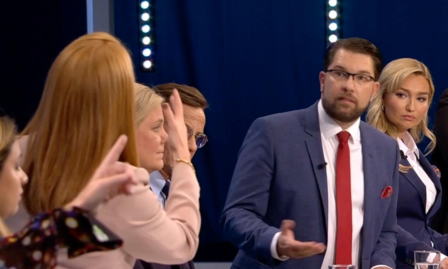 Lööf och Åkesson under partiledardebatten. 