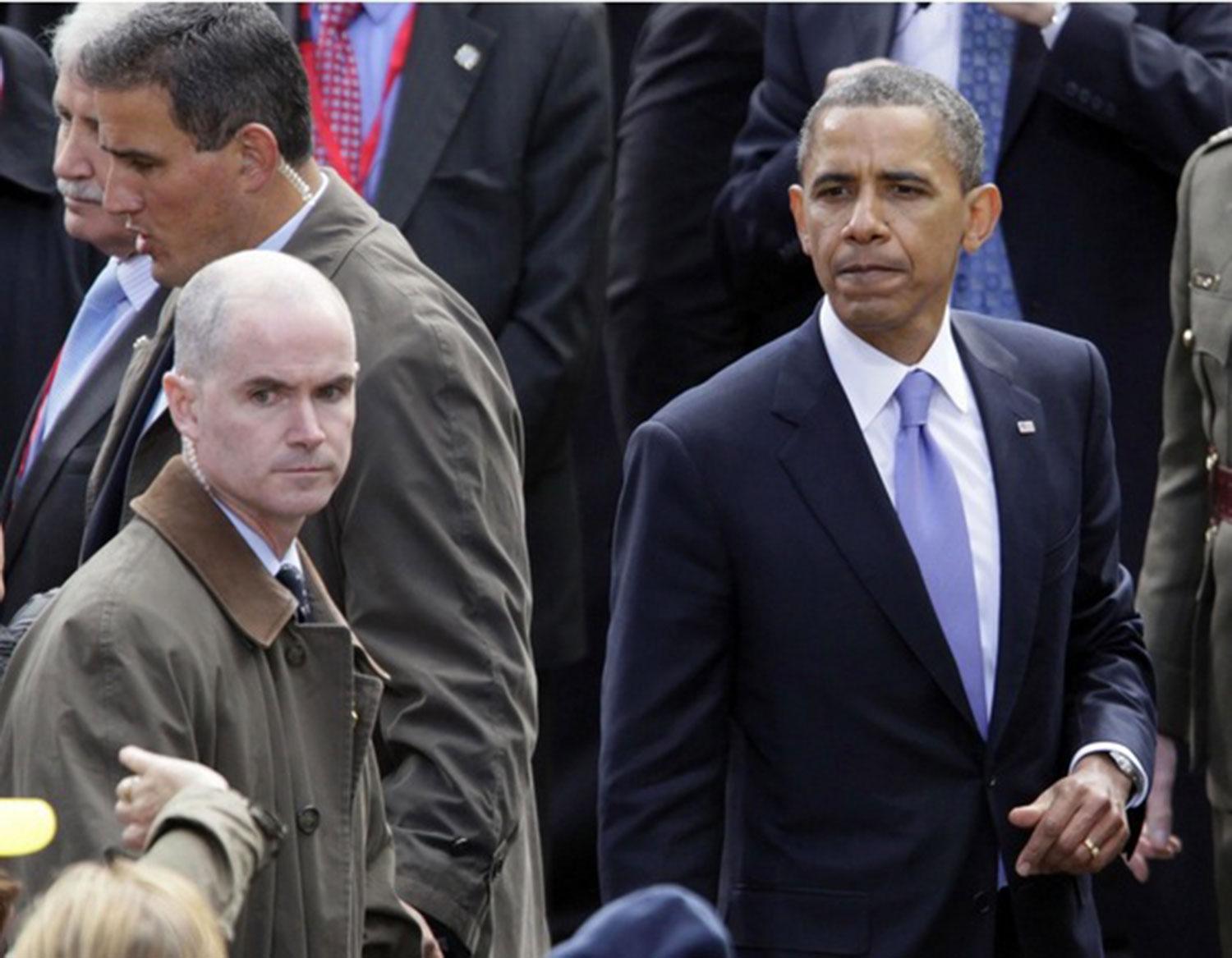 Secret Service-agenten Marc Connolly, här med president Barack Obama, är en av de två misstänkta.
