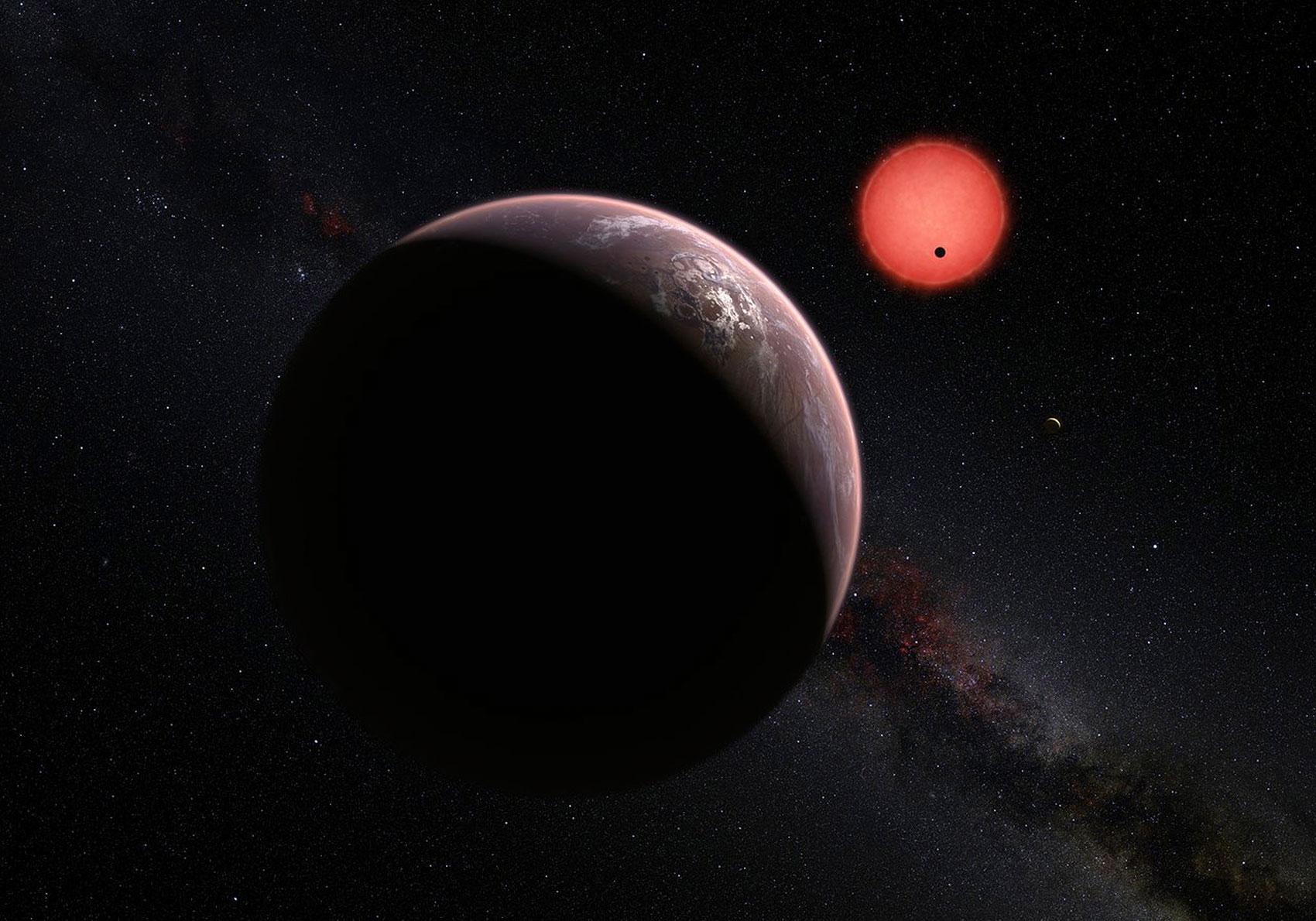Den röda dvärgplaneten är kall och liten i förhållande till solen och är vanliga i vårt solsystem. Men nu har man för första gången hittat planeter i omlopp.