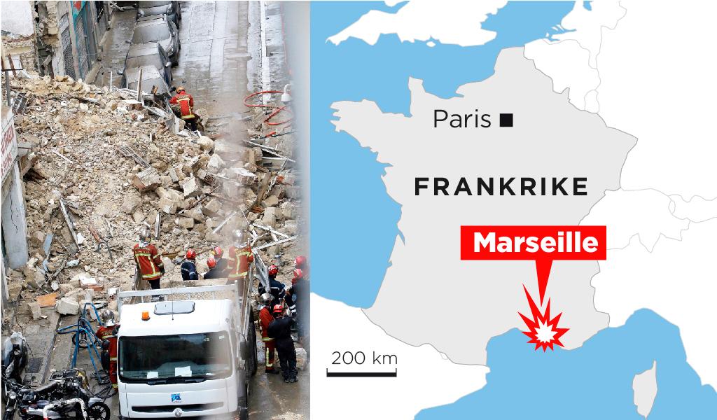 Räddningsarbetare söker efter överlevande i rasmassorna efter de kollapsade byggnaderna i Marseille i södra Frankrike.