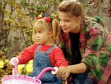 Mary-Kate Olsen och Candace Cameron som Michelle och D.J. i "Huset fullt" 1991.