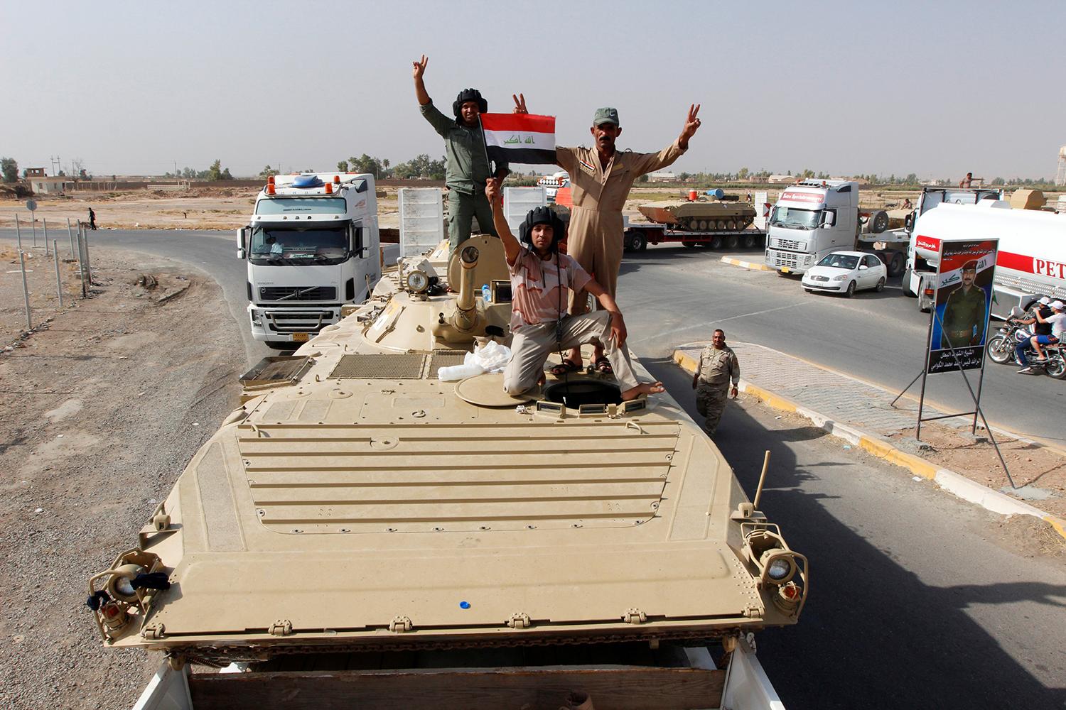 Irakiska soldater utanför Mosul. FOTO: REUTERS / TT /
