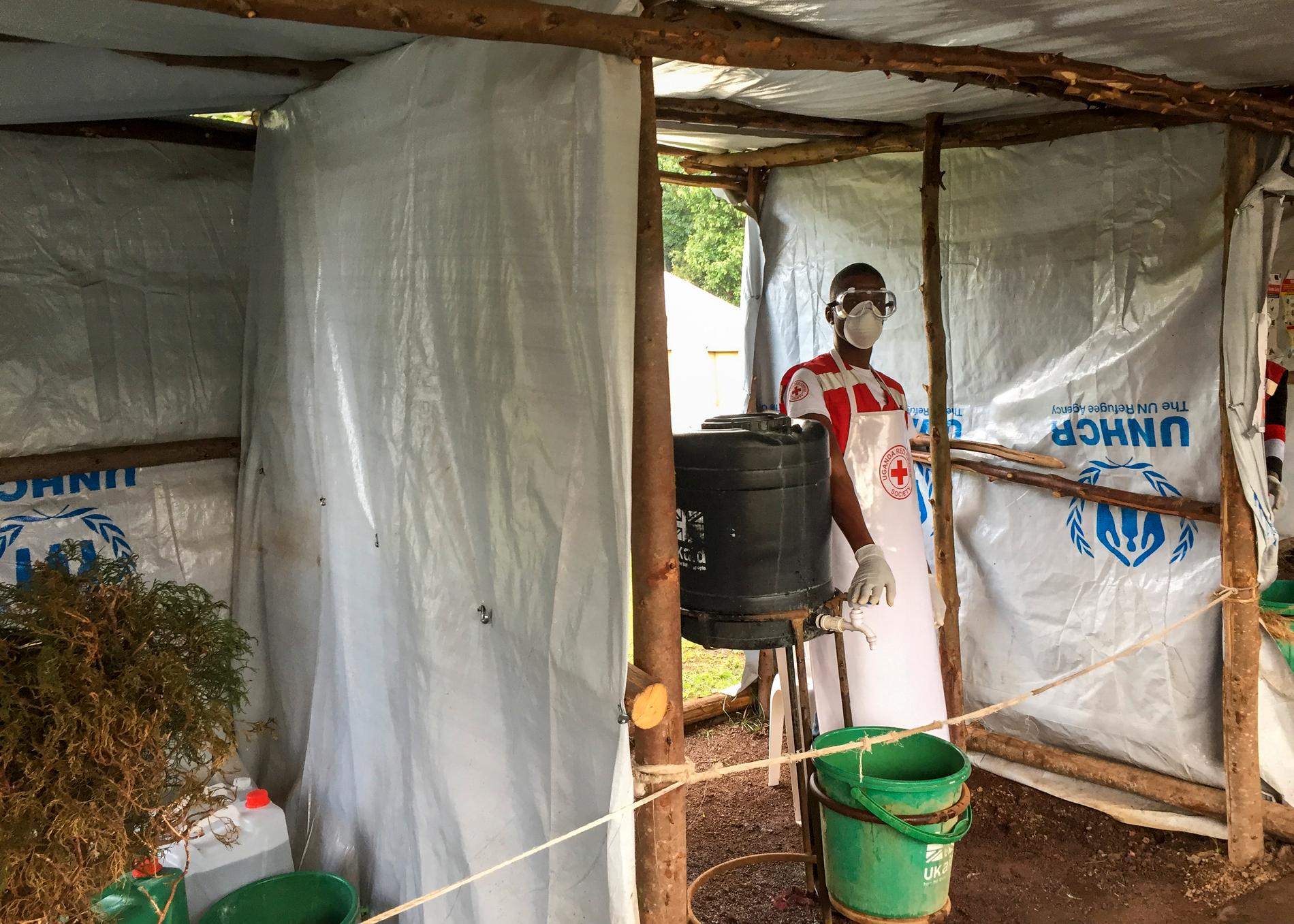 En kontrollstation för ebola vid gränsen mellan Uganda och Kongo-Kinshasa. En ugandisk pojke som besökt grannlandet har nu avlidit av sjukdomen. Bilden är tagen den 10 juni 2019.