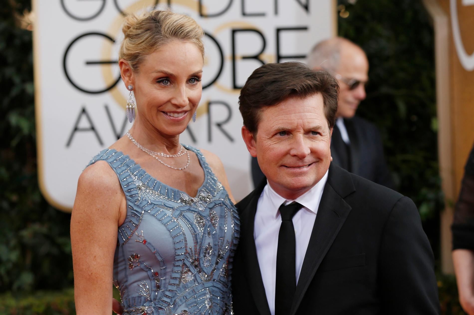 Michael J. Fox tillsammans med sin fru Tracy Pollan på Golden Globe Awards 2014.