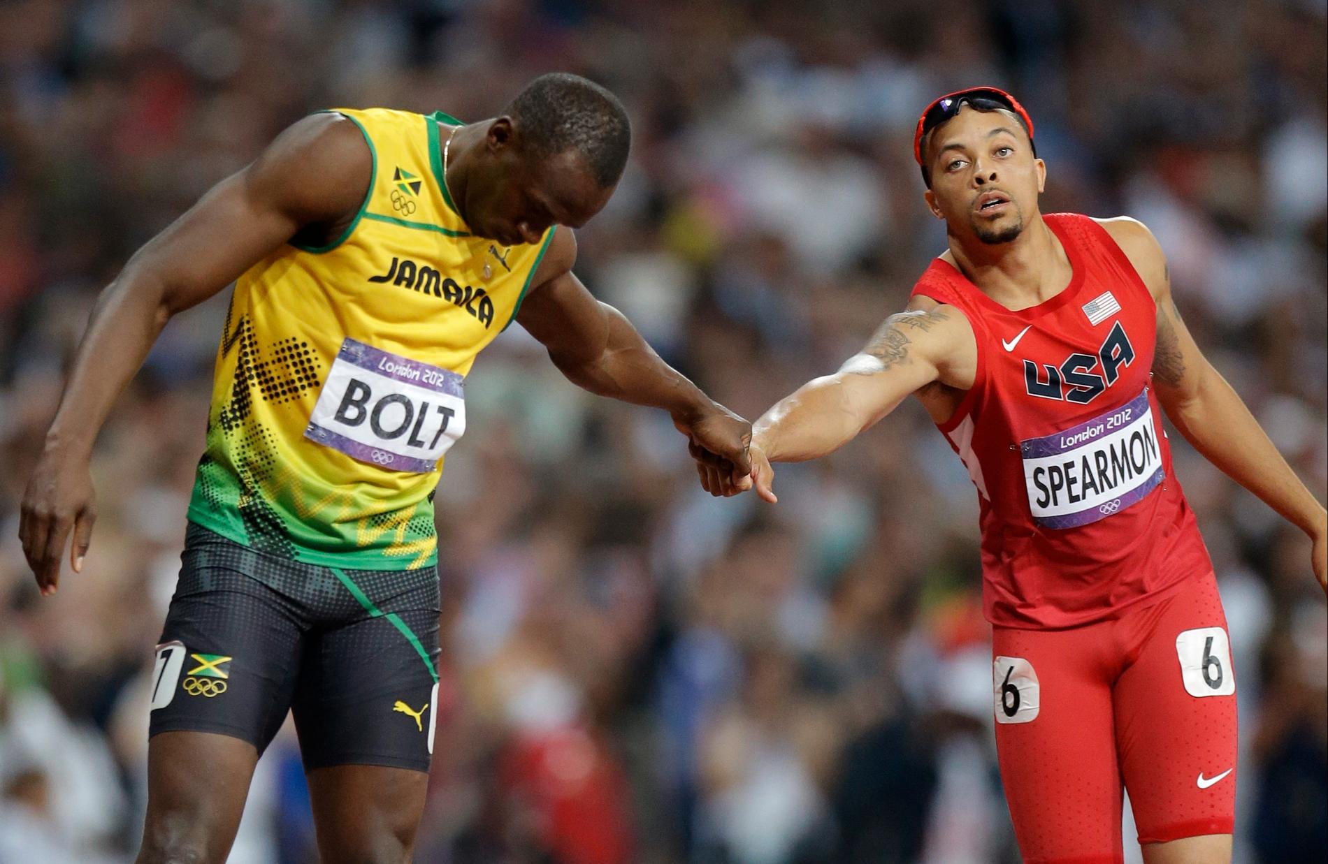 Bolt och Spearmon under OS 2012.