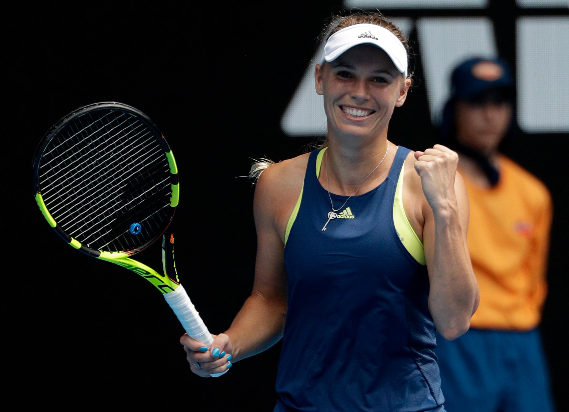Danskan Caroline Wozniacki är glad efter segern i Melbourne.