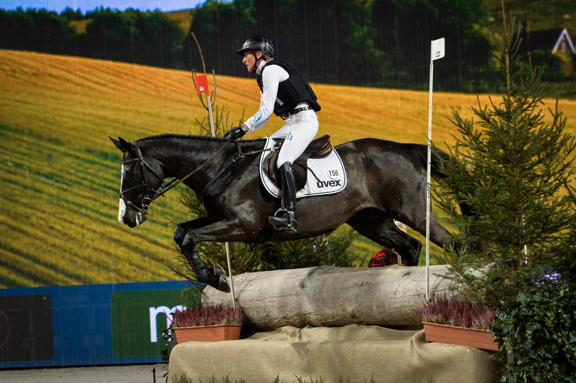 Tysklands Ingrid Klimke på hästen Parmenides vann både individuellt och i lag. Arkivbild