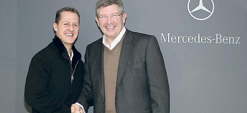 Michael Schumacher och Mercedes teamchef Ross Brawn.