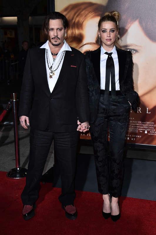 TRÄFFADES PÅ JOBBET Johnny Depp och Amber Heard gifte sig i februari förra året.