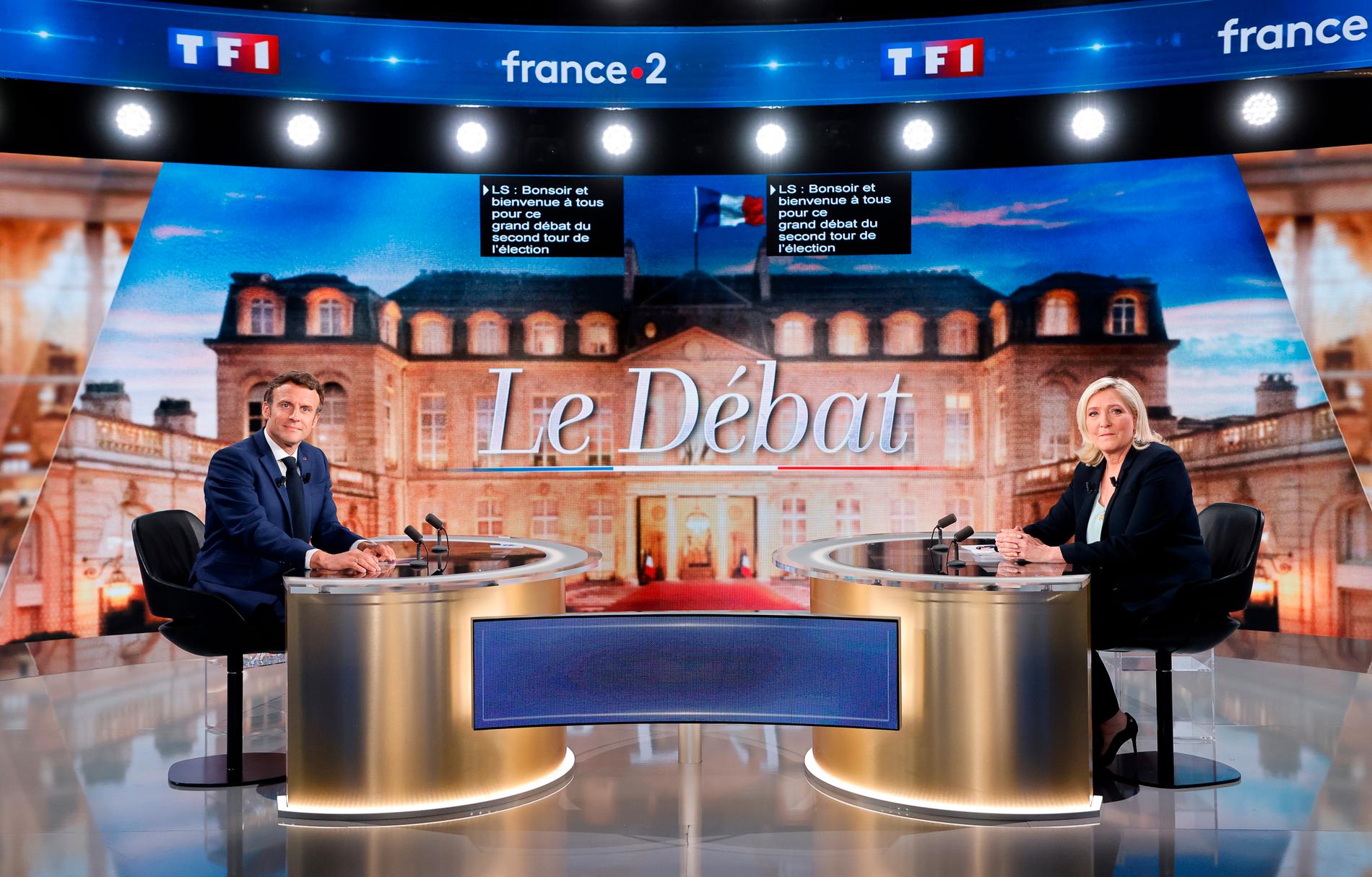 Macron och Le Pen i debatten i går.