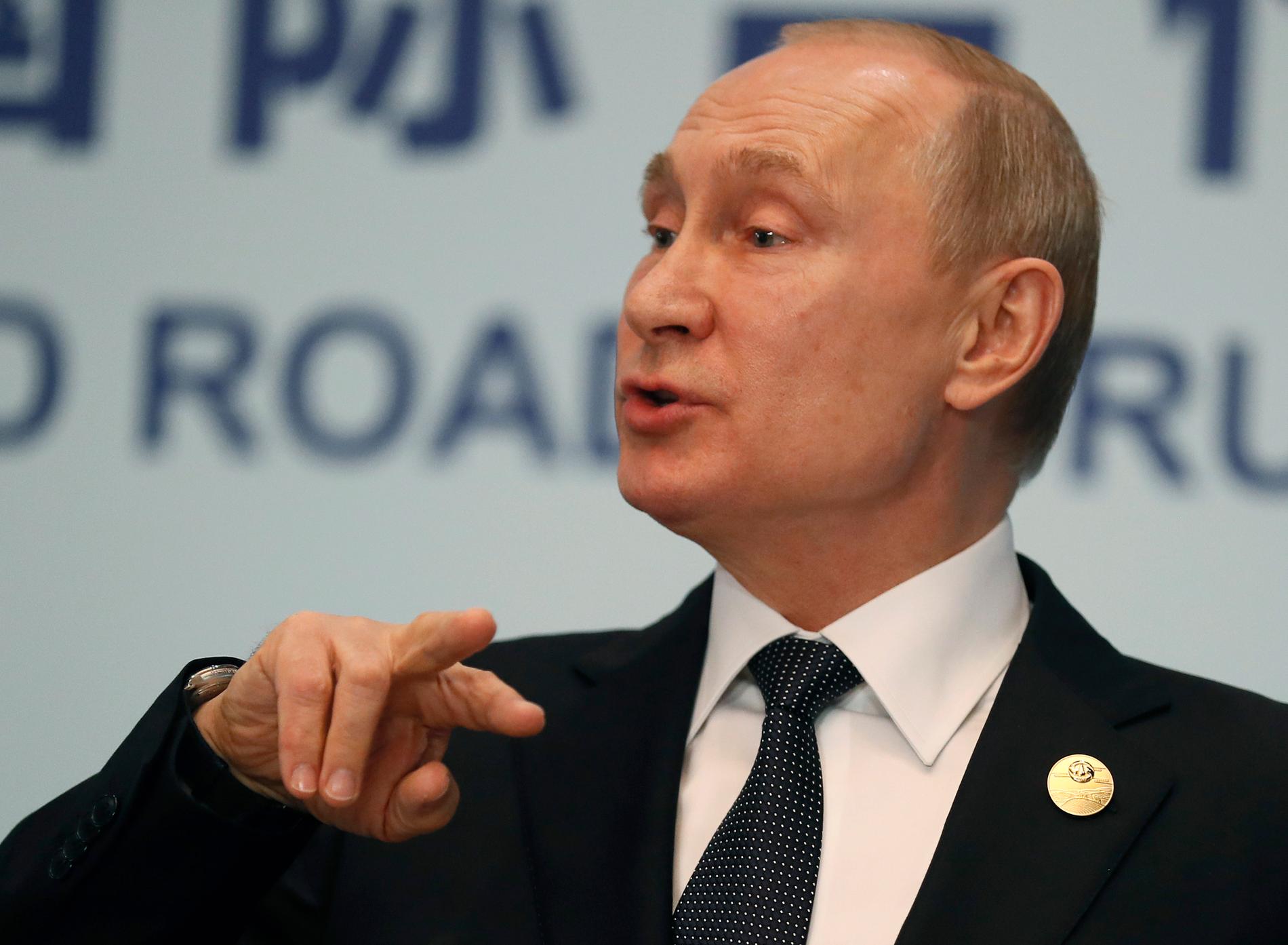 Rysslands president Vladimir Putin under pressträffen.